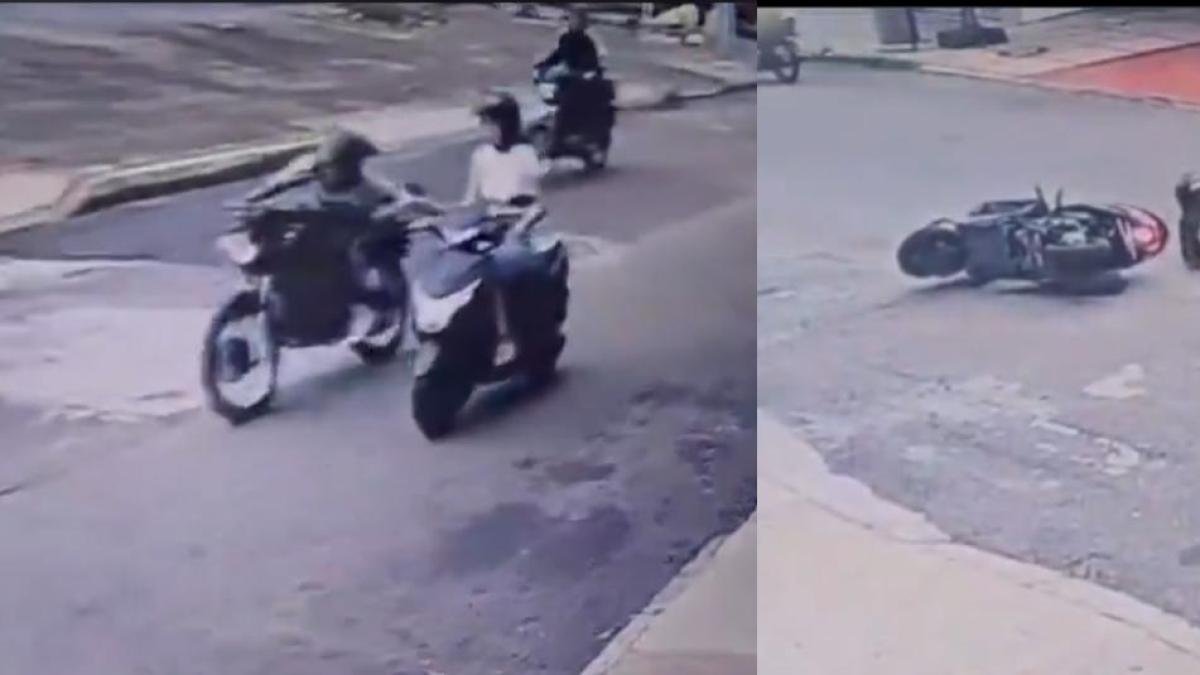 Momento en el que una Mujer es Arrastrada en su moto por un Motoladrón en Bucaramanga