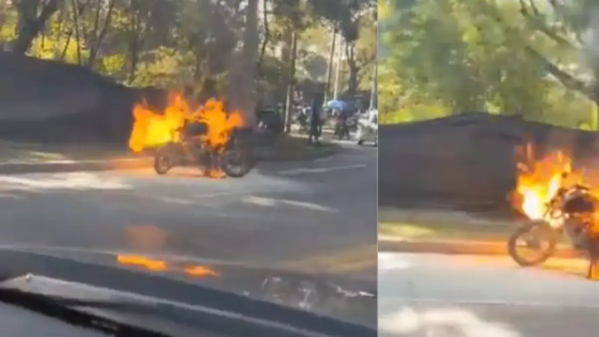 Violenta reacción de conductor que le habría prendido fuego a su moto para evadir control de tránsito en cali