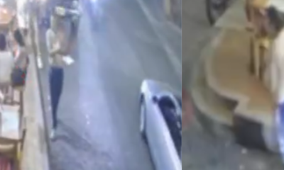 presunto responsable sonriendo en medio de la captura