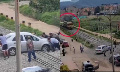 Ciudadanos se unieron para sacar un carro de las vías del tren y evitar una nueva tragedia en Duitama, Boyacá.