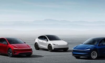 Evocadores autos eléctricos en un paisaje con montañas y cielo despejado, destacando la movilidad eléctrica moderna y ecológica.