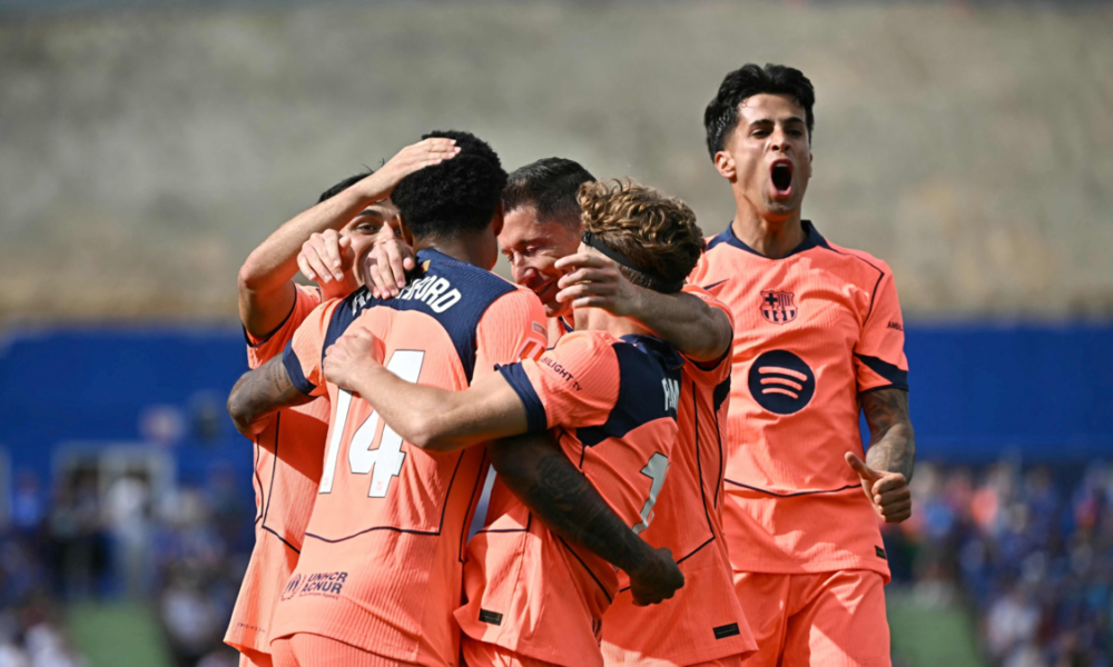 Barcelona cerca título — Barcelona vence a Getafe 0-2 y se acerca al título de Liga